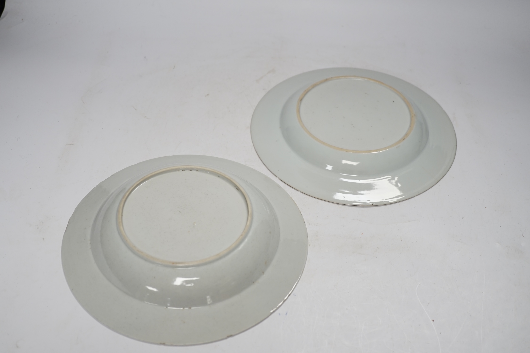 Two Chinese famille rose porcelain plates, mid 18th century, largest 23cm diameter